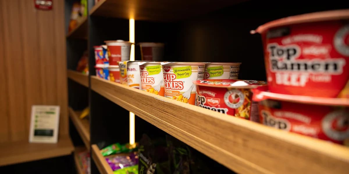 Instant noodles and quick meals stocked on the shelves of The SmAll Market